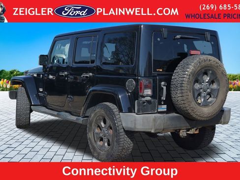 Used 2014 Jeep Wrangler Unlimited Sahara w/ Dual Top Group AWD/4WD image 3