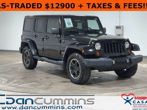 Used 2012 Jeep Wrangler Unlimited Sahara AWD/4WD image 1