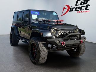 Used 2015 Jeep Wrangler Unlimited Sahara w/ Mopar Chrome Edition Group AWD/4WD video 1