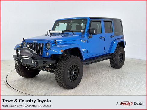 Used 2015 Jeep Wrangler Unlimited Sahara w/ Max Tow Package image 1