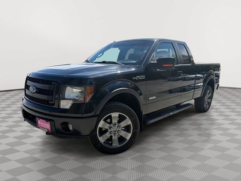 Used 2013 Ford F150 FX4 w/ Mid Equipment Group AWD/4WD image 1