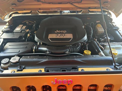 Used 2013 Jeep Wrangler Unlimited Sport w/ Mopar Black Appearance Group image 30