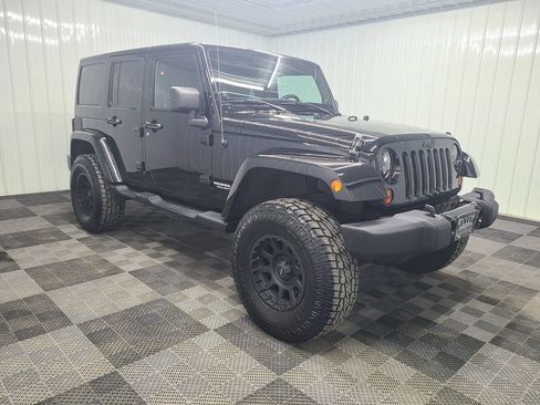 Used 2012 Jeep Wrangler Unlimited Sahara AWD/4WD image 1