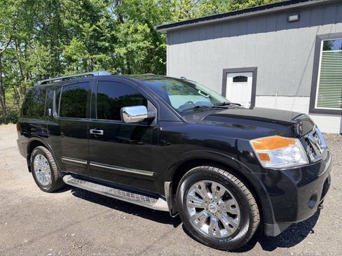 Used 2015 Nissan Armada Platinum w/ 2nd Row Captain Seat Package AWD/4WD image 1