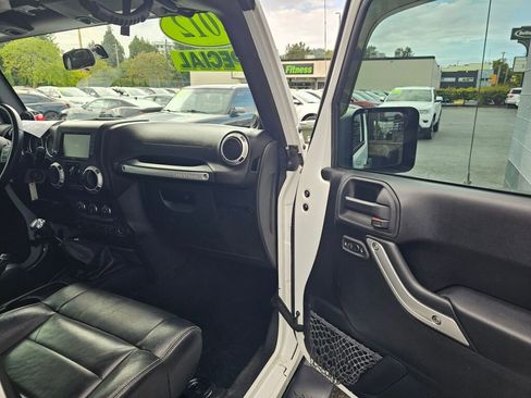 Used 2012 Jeep Wrangler Unlimited Sahara w/ Dual Top Group image 11