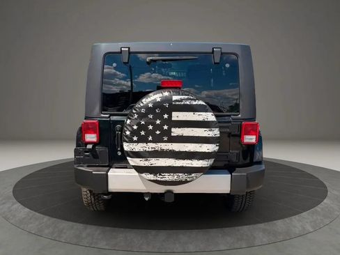 Used 2014 Jeep Wrangler Unlimited Sahara w/ Dual Top Group AWD/4WD image 5