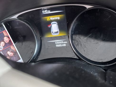 Used 2015 Nissan Rogue SV FWD image 1