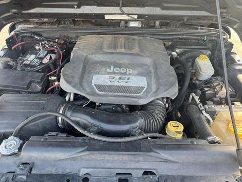 Used 2012 Jeep Wrangler Unlimited Sport AWD/4WD image 23