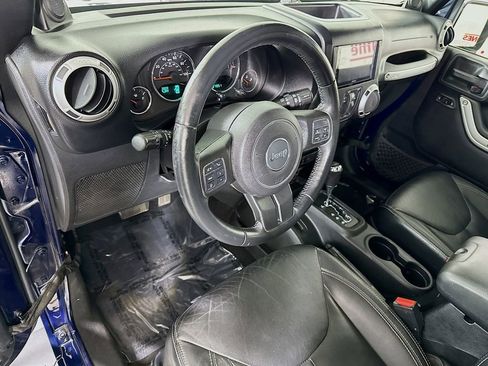 Used 2013 Jeep Wrangler Unlimited Sahara w/ Dual Top Group AWD/4WD image 17