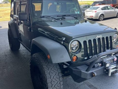 Used 2011 Jeep Wrangler Unlimited Rubicon w/ Dual Top Group AWD/4WD image 6