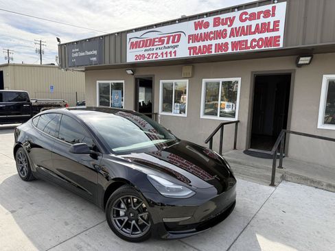 Used 2021 Tesla Model 3 Standard Range Plus RWD image 1