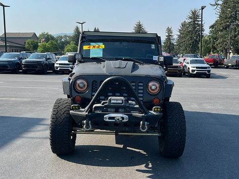 Used 2013 Jeep Wrangler Unlimited Rubicon w/ Dual Top Group AWD/4WD image 2