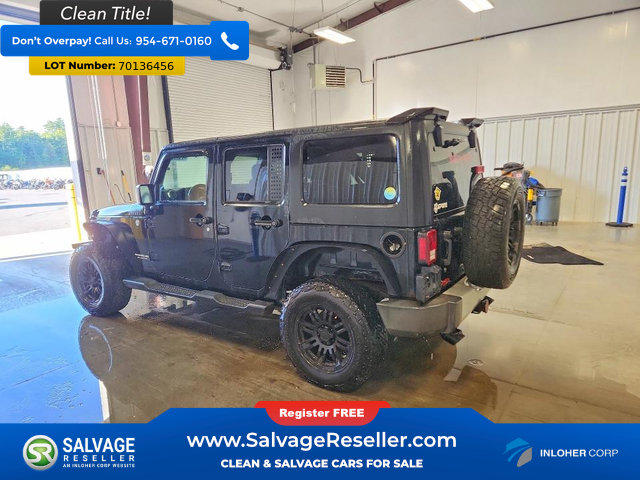 Used 2012 Jeep Wrangler Unlimited Sahara w/ Dual Top Group AWD/4WD image 3