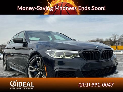Used 2020 BMW M550i xDrive w/ Premium Package image 1