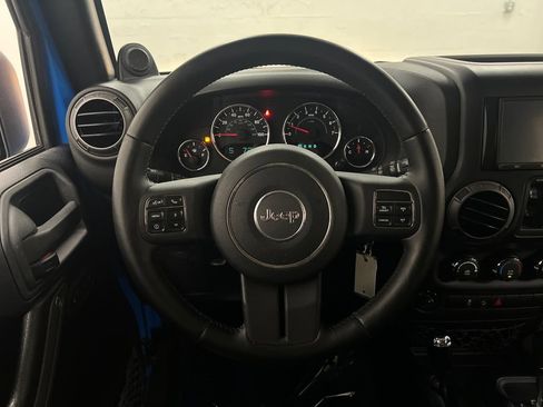 Used 2012 Jeep Wrangler Unlimited Sport AWD/4WD image 16