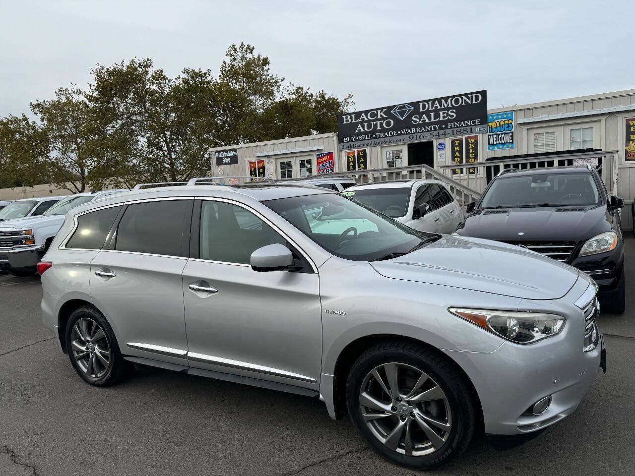 Used 2015 INFINITI QX60 AWD Hybrid w/ HEV Deluxe Touring Package image 1