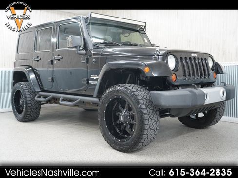 Used 2012 Jeep Wrangler Unlimited Sahara w/ Mopar Chrome Edition Group image 1