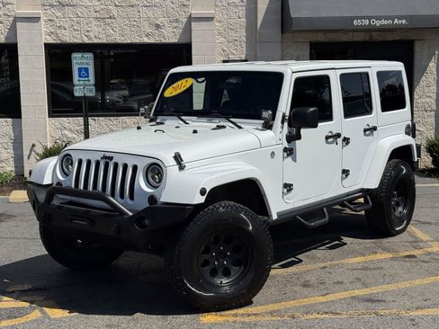 Used 2012 Jeep Wrangler Unlimited Sahara w/ Dual Top Group AWD/4WD image 2