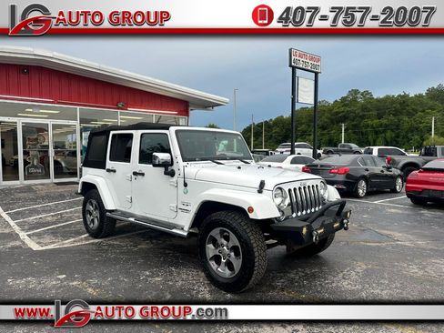 Used 2016 Jeep Wrangler Unlimited Sahara w/ Dual Top Group image 1