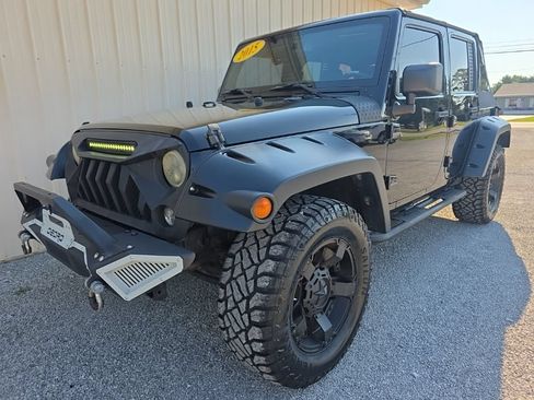 Used 2015 Jeep Wrangler Unlimited Sahara w/ Dual Top Group AWD/4WD image 11