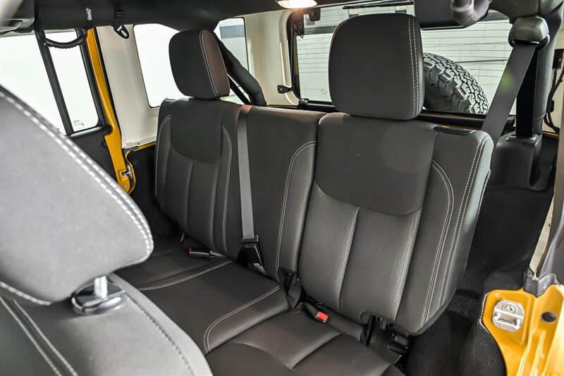 Used 2014 Jeep Wrangler Unlimited Sahara w/ Dual Top Group AWD/4WD image 16
