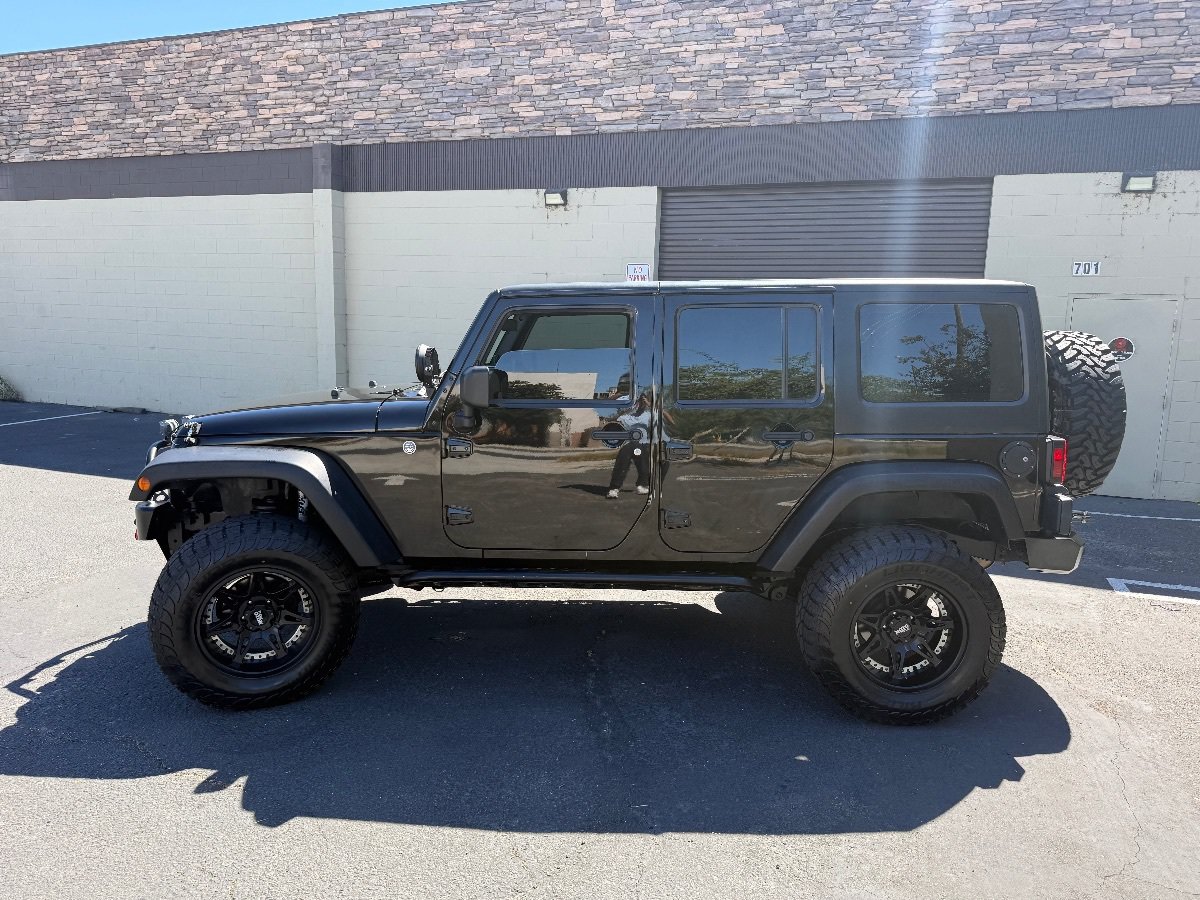 Used 2012 Jeep Wrangler Unlimited Sport w/ Max Tow Pkg AWD/4WD image 4