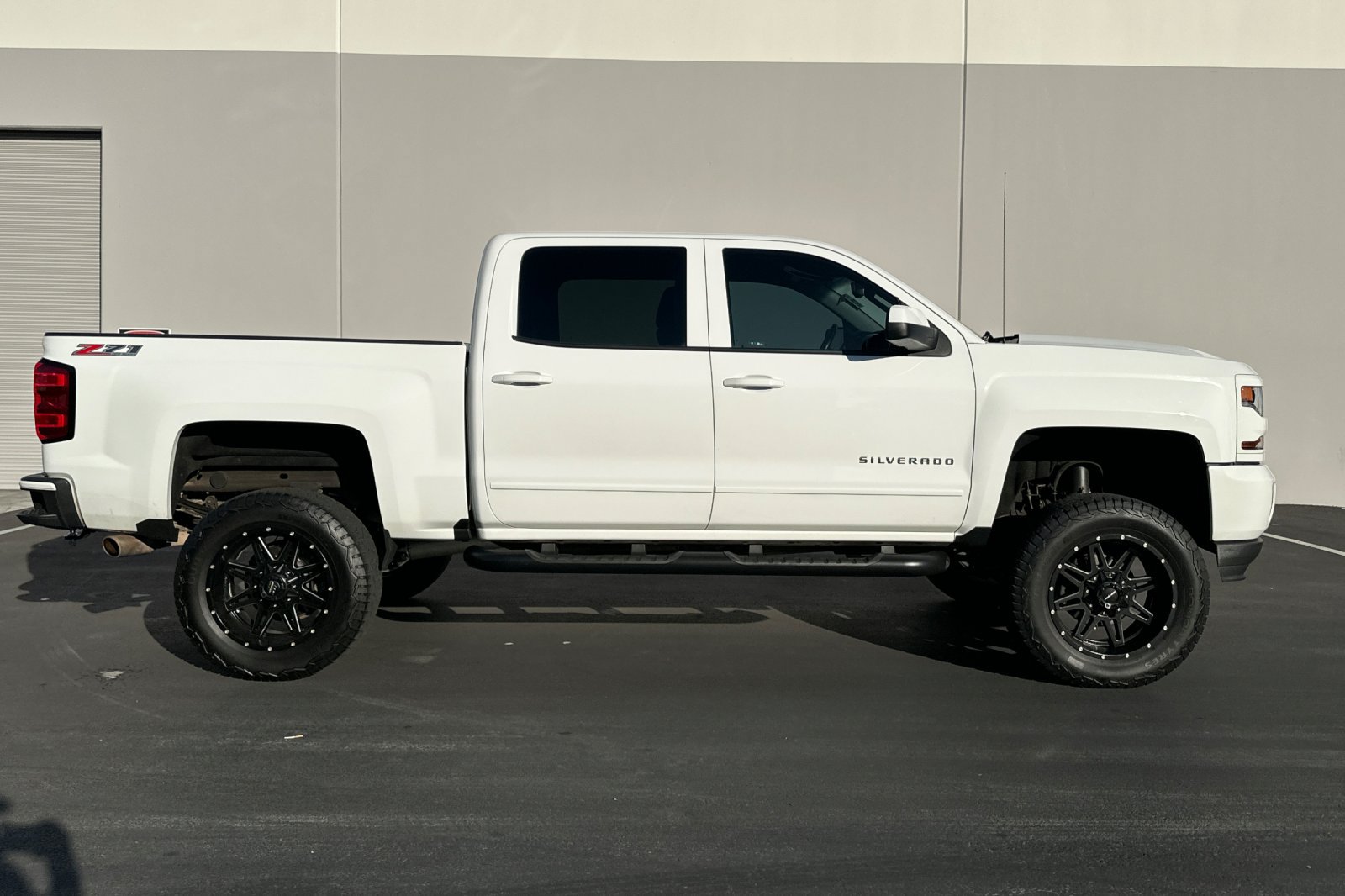 Used 2017 Chevrolet Silverado 1500 LT w/ LPO, Black Pack AWD/4WD image 3
