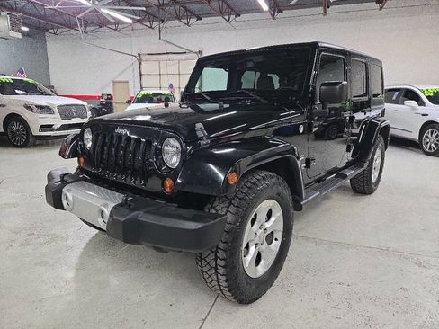 Used 2013 Jeep Wrangler Unlimited Sahara w/ Trailer Tow Group image 1