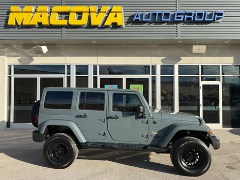 Used 2014 Jeep Wrangler Unlimited Sahara w/ Max Tow Package image 1