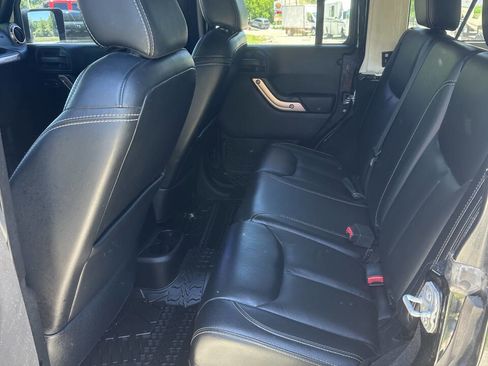 Used 2014 Jeep Wrangler Unlimited Rubicon w/ Dual Top Group AWD/4WD image 5
