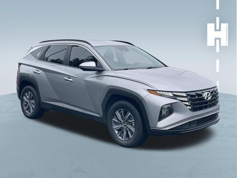 Used 2022 Hyundai Tucson Blue w/ Cargo Package AWD/4WD image 1
