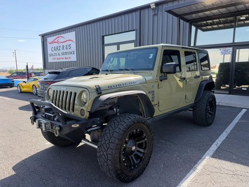 Used 2013 Jeep Wrangler Unlimited Rubicon w/ Dual Top Group AWD/4WD image 3