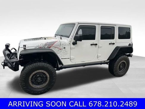 Used 2016 Jeep Wrangler Unlimited Sahara AWD/4WD image 1