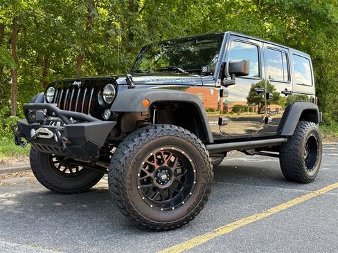 Used 2015 Jeep Wrangler Unlimited Rubicon w/ Dual Top Group AWD/4WD image 2