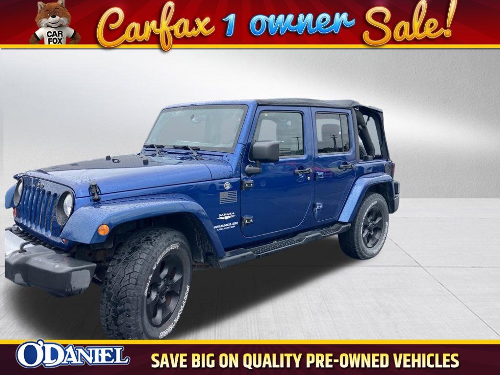 Used 2009 Jeep Wrangler Unlimited Sahara w/ Dual Top Group AWD/4WD image 1