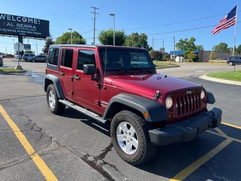 Used 2012 Jeep Wrangler Unlimited Sport AWD/4WD image 1