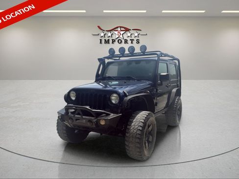 Used 2013 Jeep Wrangler Sahara w/ Dual Top Group AWD/4WD image 1