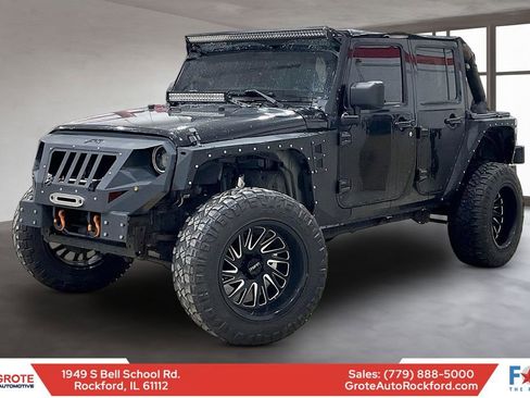Used 2013 Jeep Wrangler Unlimited Sport image 1