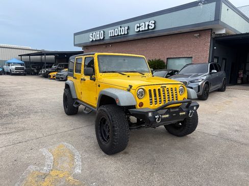 Used 2011 Jeep Wrangler Unlimited Sport AWD/4WD image 2