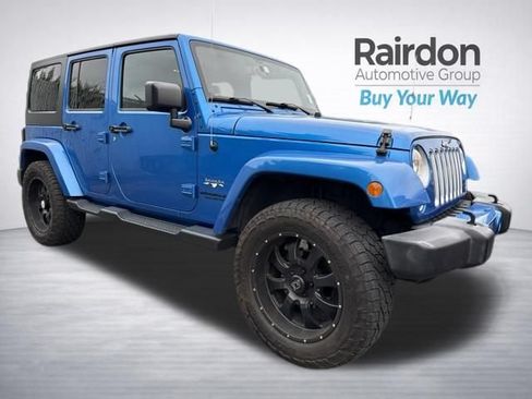 Used 2016 Jeep Wrangler Unlimited Sahara AWD/4WD image 1