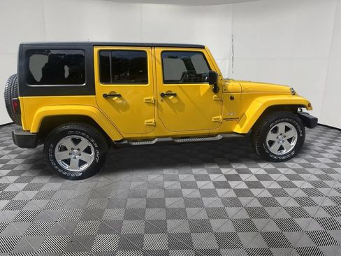 Used 2011 Jeep Wrangler Unlimited Sahara w/ Dual Top Group AWD/4WD image 8