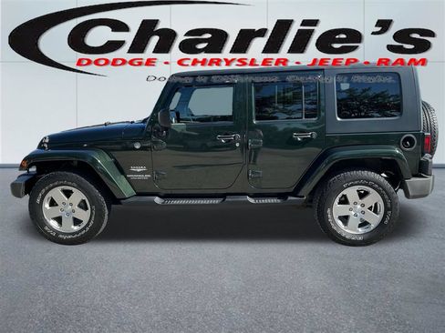 Used 2010 Jeep Wrangler Unlimited Sahara w/ Dual Top Group AWD/4WD image 1