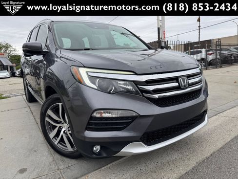 Used 2016 Honda Pilot Touring image 1