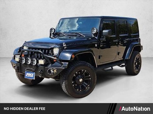 Used 2012 Jeep Wrangler Unlimited Rubicon w/ Dual Top Group AWD/4WD image 1
