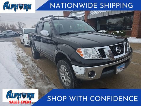 Used 2012 Nissan Frontier SL image 1