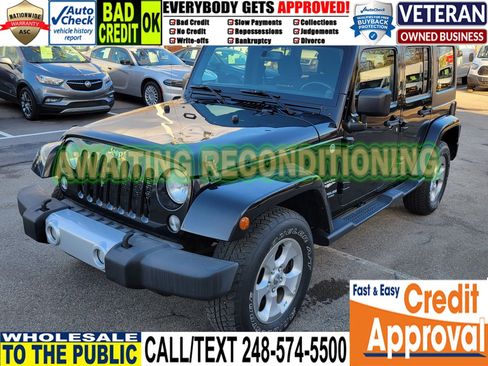Used 2014 Jeep Wrangler Unlimited Sahara w/ Dual Top Group AWD/4WD image 1