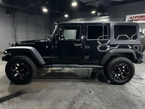 Used 2014 Jeep Wrangler Unlimited Rubicon w/ Connectivity Group AWD/4WD image 4