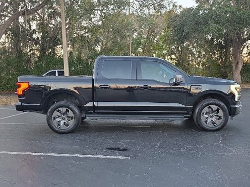 Certified 2023 Ford F150 Lightning XLT w/ Equipment Group 312A High image 8