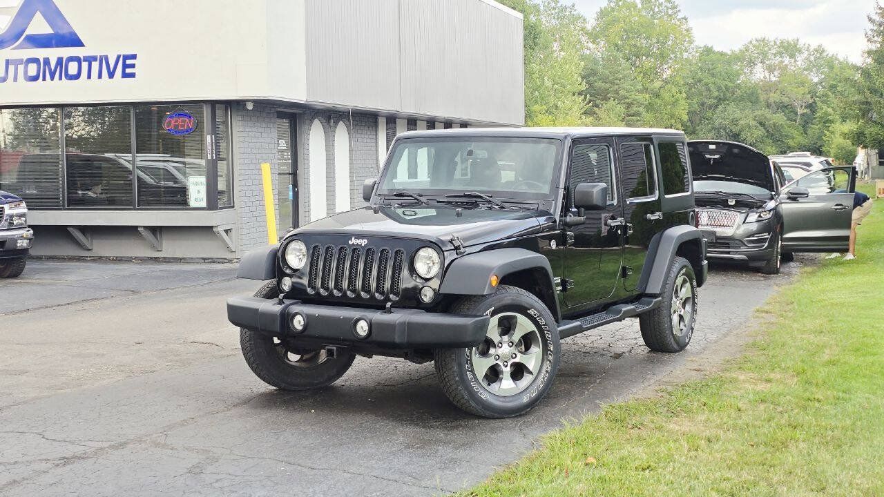 Used 2014 Jeep Wrangler Unlimited Sport w/ Dual Top Group AWD/4WD image 2