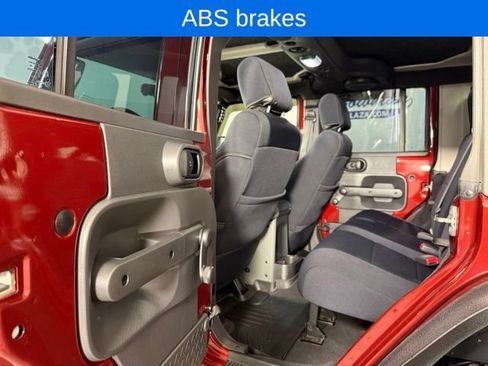 Used 2010 Jeep Wrangler Unlimited Sport w/ Black Appearance Group AWD/4WD image 12